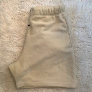 Cream Essentials size medium
